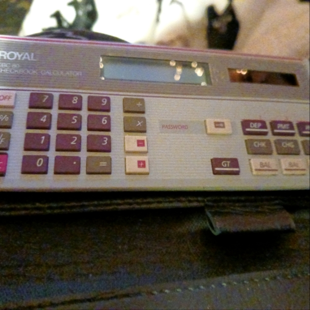 Vintage Royal leather checkbook calculator.